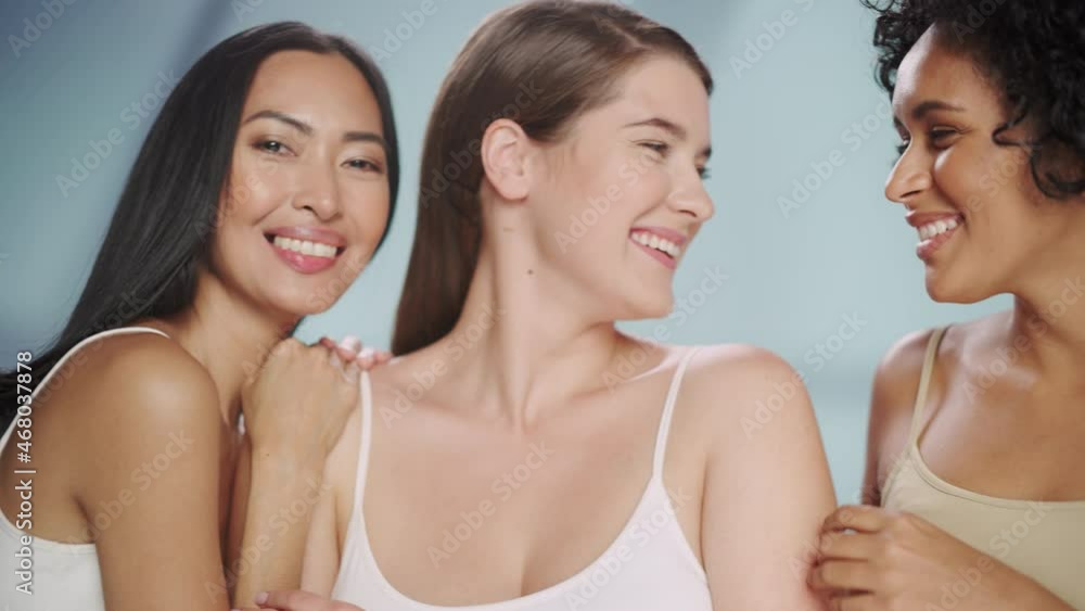 Beauty Portrait of Three Diverse Multiethnic Models on Isolated Background. Laughing Happy Asian, Black and Caucasian Women with Natural, Healthy Skin. Wellness, Spa, Cosmetology, Skincare Concept. Beauty Portrait of Three Diverse Multiethnic Models on Isolated Background. Laughing Happy Asian, Black and Caucasian Women with Natural, Healthy Skin. Wellness, Spa, Cosmetology, Skincare Concept.