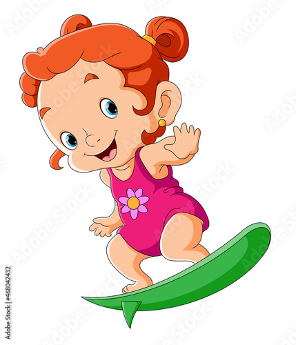 Canvas Print The happy girl is playing the surfing board