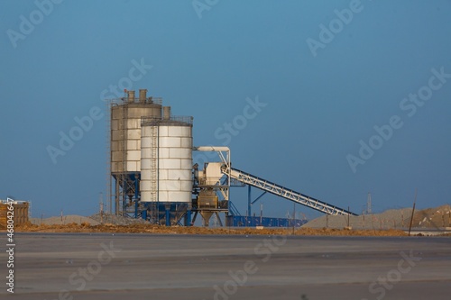 Big construction site on the outskirts near the road