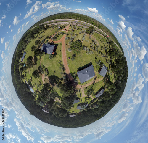 Globe panorama. stereographic projection of green park and ciy view. 360 degree panorama. little planet photo