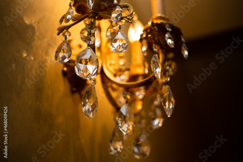 Expensive exquisite crystal chandelier in Victorian style indoor © Hennadii