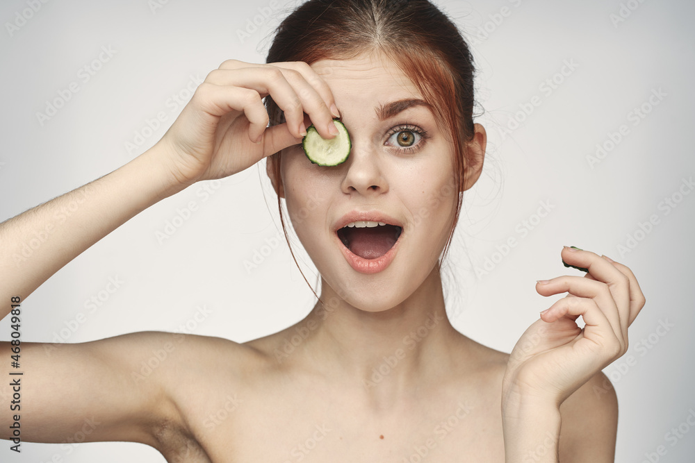 cheerful woman with cucumbers in hands cosmetology vitamins health cheerful woman with cucumbers in hands cosmetology vitamins health