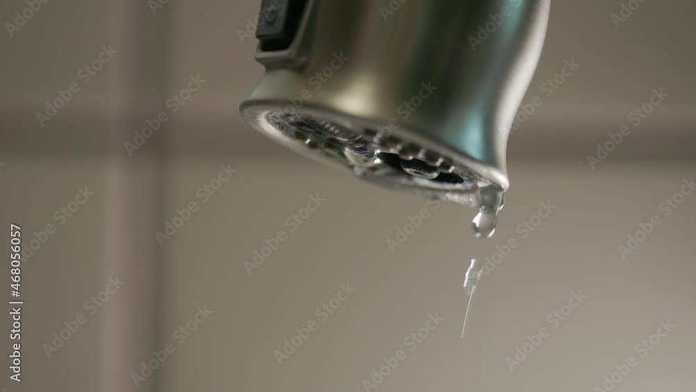 A leaky kitchen faucet wasting water not helpful in times of draught. A leaky kitchen faucet wasting water not helpful in times of draught.