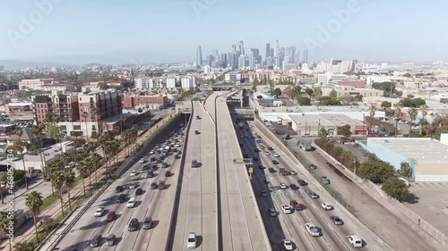 Aerial view Los Angeles freeway. Busy highway with cars. California urban life commute, travel destination in America, modern city in USA. Drone 4k.
