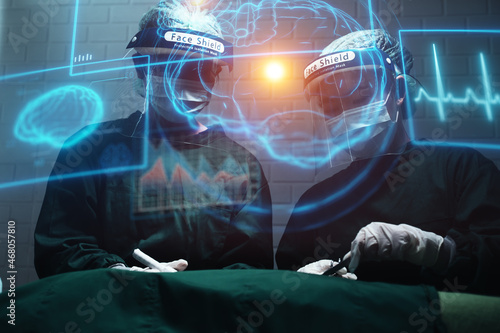Doctor surgeon brain operation patient with hologram using computer user interface UI hologram simulation technology concept, futuristic innovation creative tech medical healthcare diagnosis testing