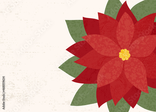 A red poinsettia flower in a cut paper style with textures with copyspace
