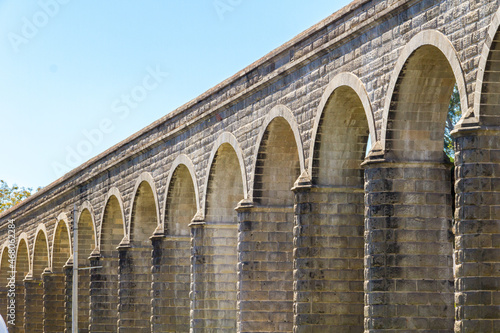 Architectural arches of an antique aqueduct in the main city of Guadalajara in Mexico 