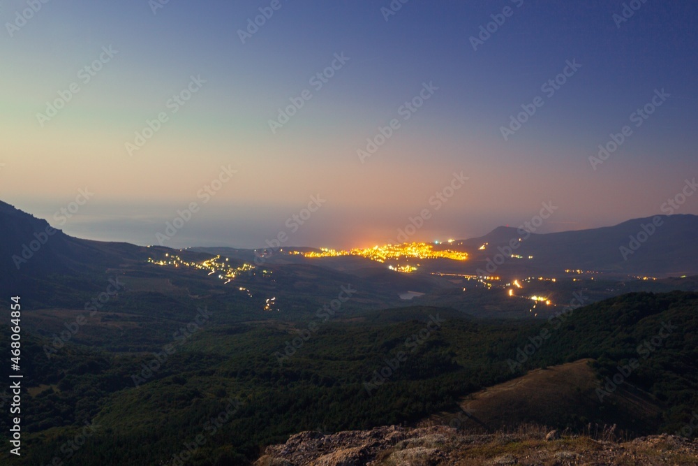 Fototapeta premium Hills with City Lights