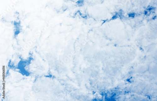 Blue sky scenery with white fluffy clouds for the background.