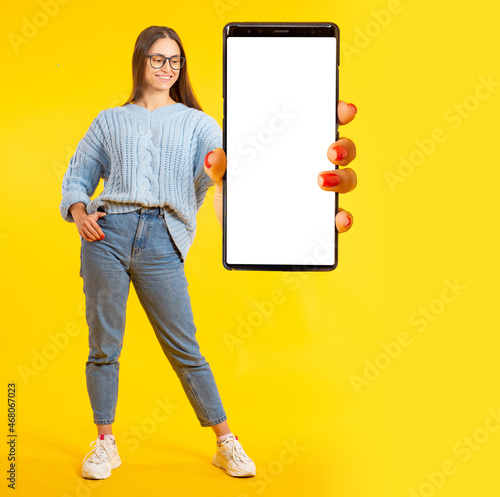 Phone mockup. Woman hand ho...