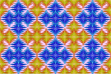 Seamless geometric ethnic fabric pattern, blue yellow gold floral pattern assembled into a square grid, Thai fabric pattern design, carpet, wallpaper, curtain, cushion, clothing, wrap, batik, sarong