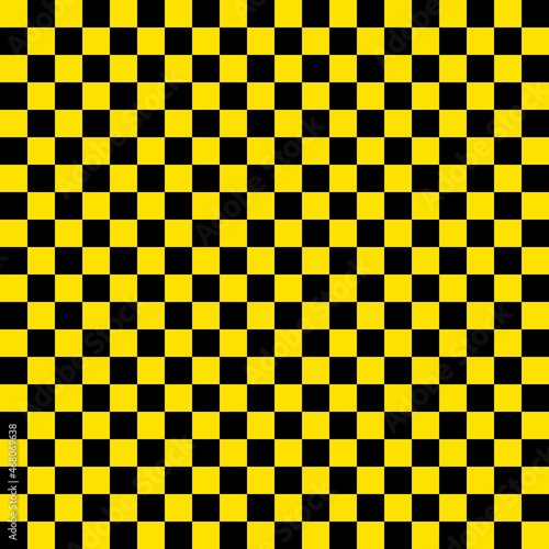 Two color checkerboard. Black and Yellow colors of checkerboard. Chessboard, checkerboard texture. Squares pattern. Background.