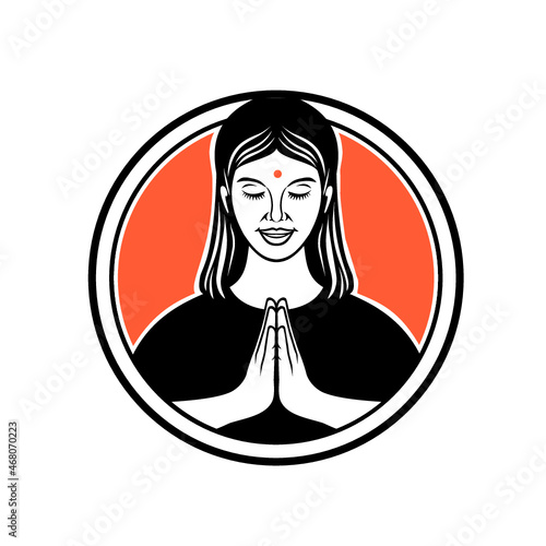 Retro style illustration of an Indian girl or woman in namaste, namaskar or namaskaram, a Hindu customary, non-contact form of respectfully greeting and honoring set in circle on isolated background.