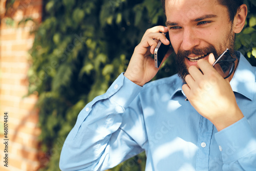 business man with phone outdoors communication lifestyle