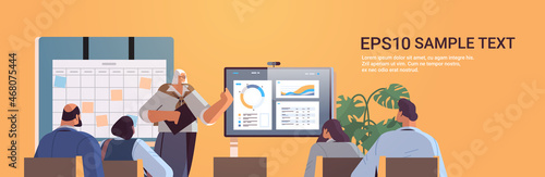 businesswoman presenting financial statistic diagram for businesspeople at conference meeting business presentation