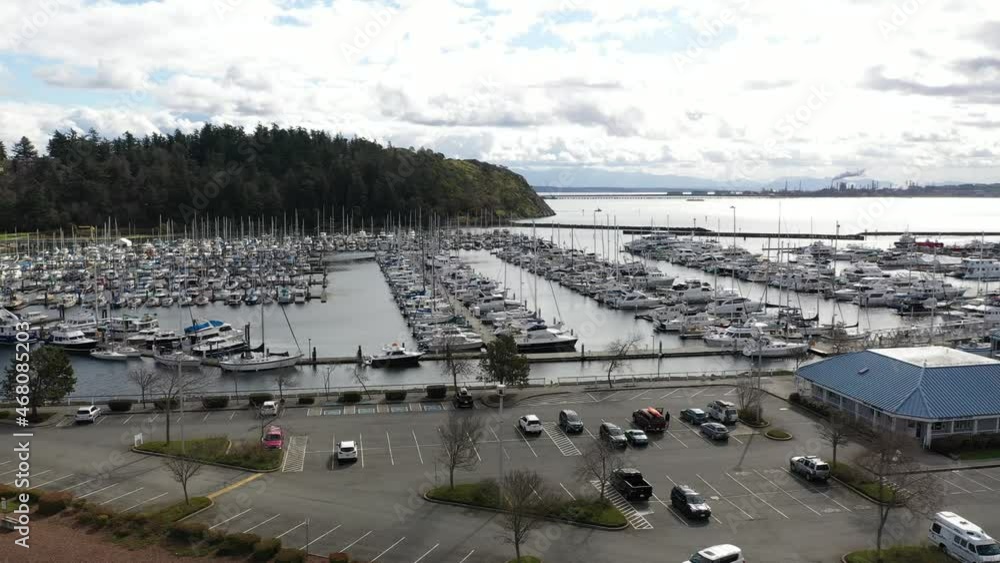 Cinematic 4K aerial drone pan footage of Cap Sante Park and marina ...
