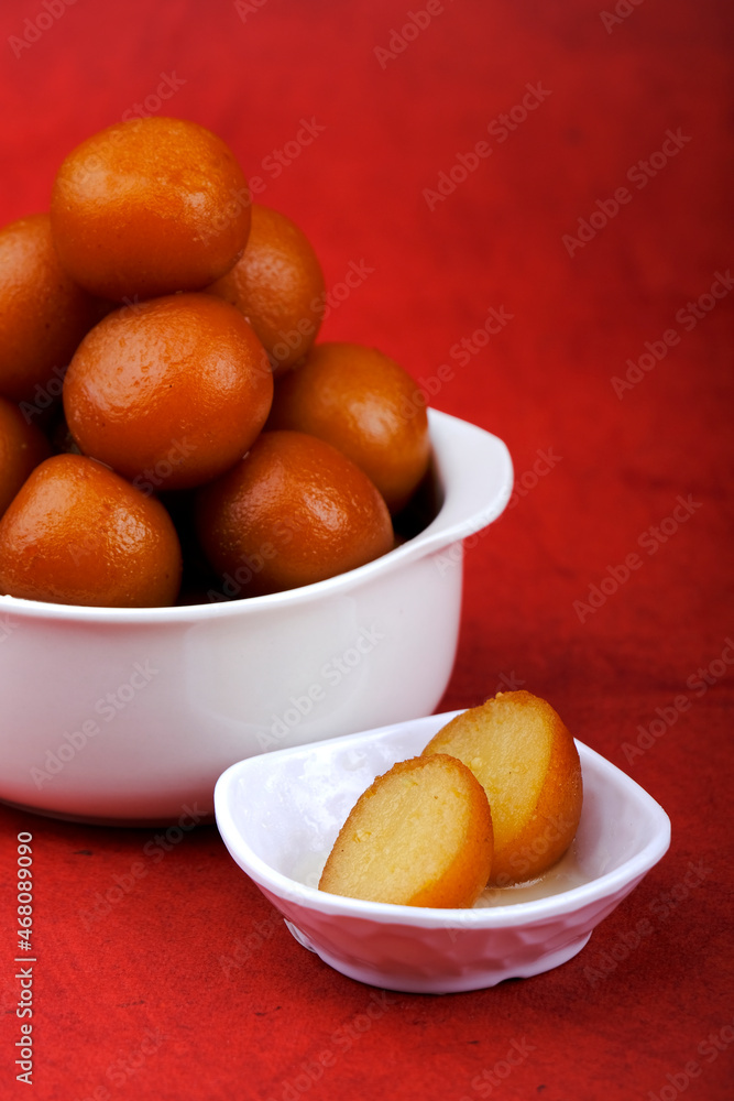Indian Traditional Special Sweet Food Gulab Jamun, Indian Dessert or Sweet Dish, popular festival or wedding food. Indian Traditional Special Sweet Food Gulab Jamun, Indian Dessert or Sweet Dish, popular festival or wedding food.