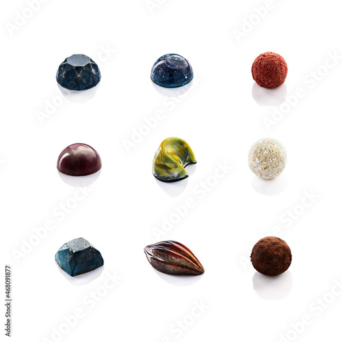 Fototapeta Naklejka Na Ścianę i Meble -  Set of multi-colored handmade chocolates.