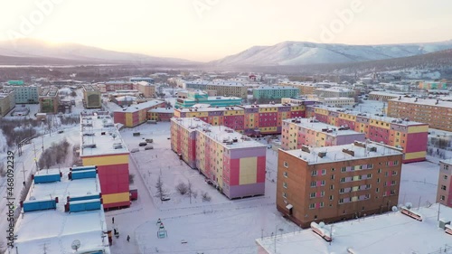 Footage of the small polar town of Bilibino in Chukotka, taken in winter at sunset on a quadcopter