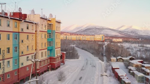 Footage of the small polar town of Bilibino in Chukotka, taken in winter at sunset on a quadcopter
