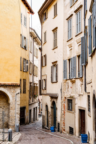 Narrow streets with old houses. Bergamo, Italy © Nadtochiy