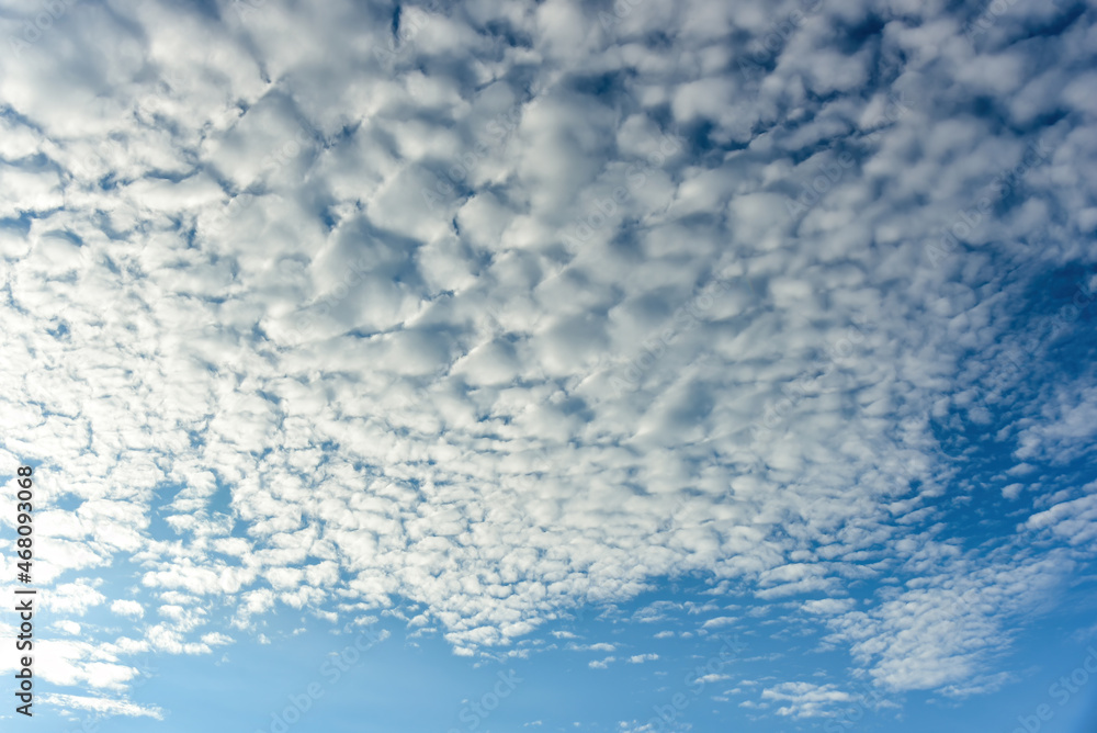 Puffy fluffy white clouds against daytime sky. Puffy fluffy white clouds against daytime sky.