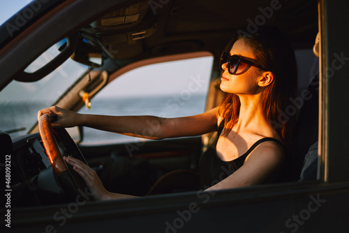 woman driving in car trip posing fashion travel © VICHIZH