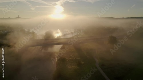 Foggy golden morning, aerial drone view, bridge over Ruhr river Hattingen photo