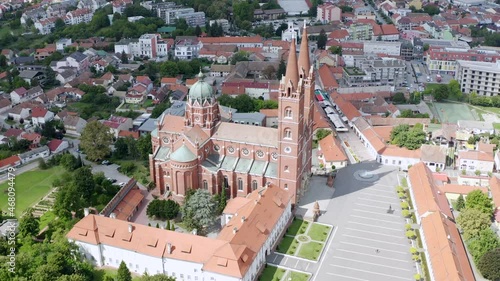 View Of The Old St. Peter Cathedral In Djakovo, Croatia During Summer - aerial drone shot photo