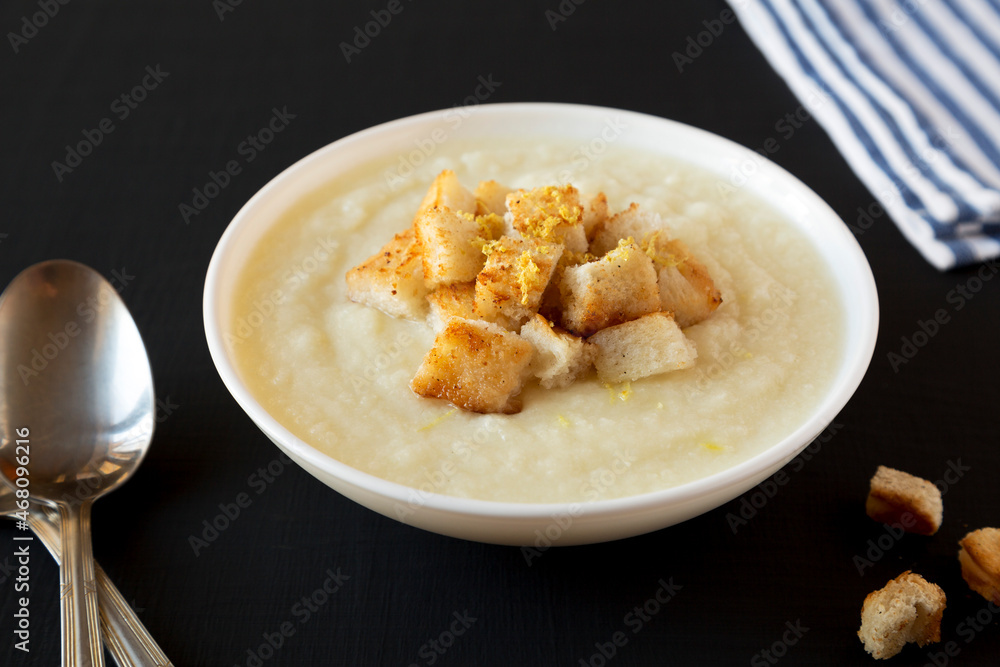 Homemade Cauliflower Soup with Croutons and Oil, side view. Homemade Cauliflower Soup with Croutons and Oil, side view.