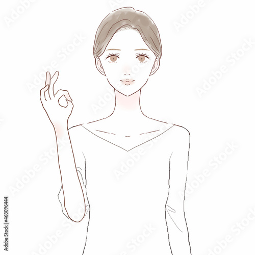 OKサインを出す女性