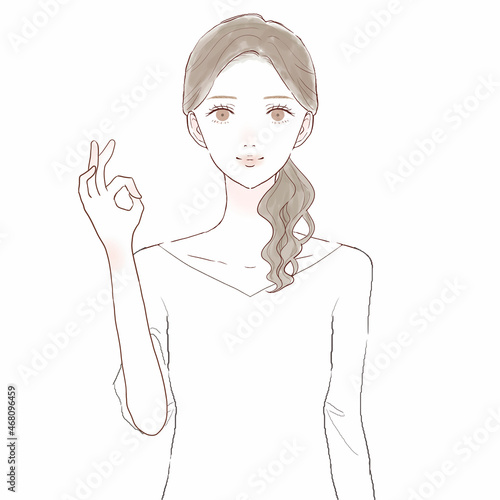 OKサインを出す女性