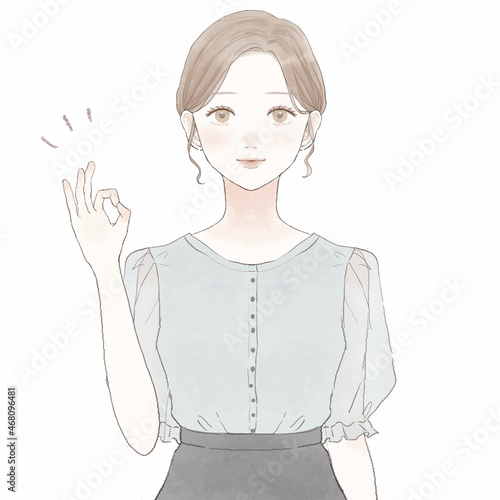 OKサインを出す女性