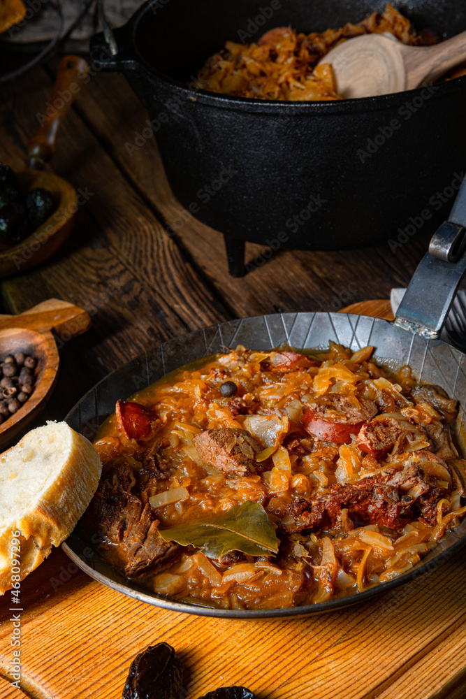 Polish bigos cooked according to an old recipe with wine and plum Polish bigos cooked according to an old recipe with wine and plum