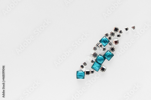 composition of rhinestones on a white background
