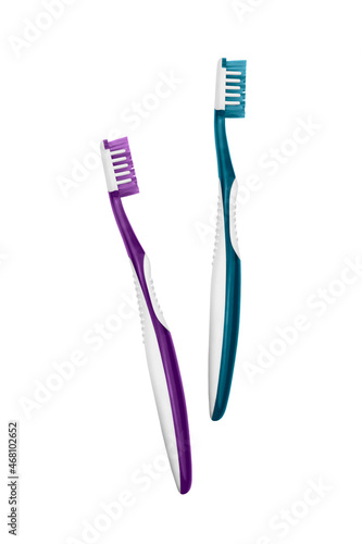 Two plastic toothbrushes isolated on white background.