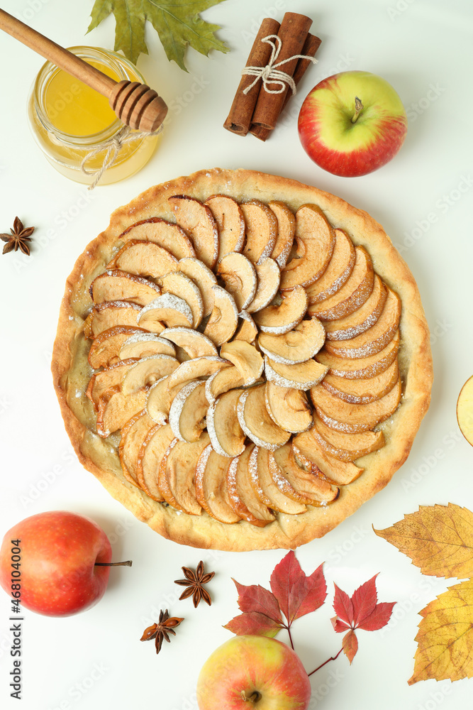 Concept of tasty food with apple pie on white background Concept of tasty food with apple pie on white background