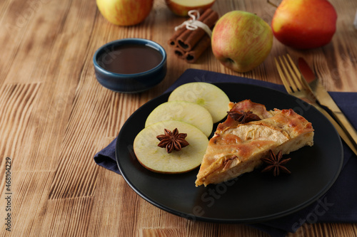 Concept of tasty food with apple pie on wooden background photo