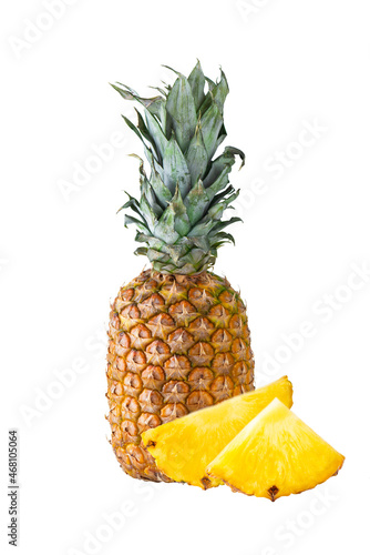Fresh pineapple with cut pieces isolated on white background.