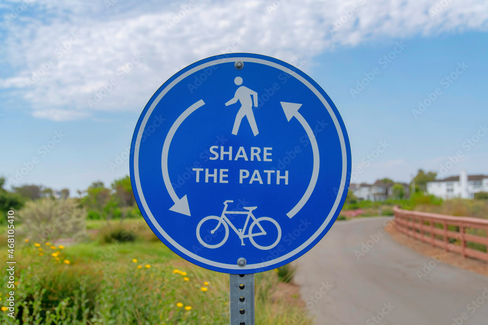 Share the Path sign on a circular road sign at the Newport Beach in California