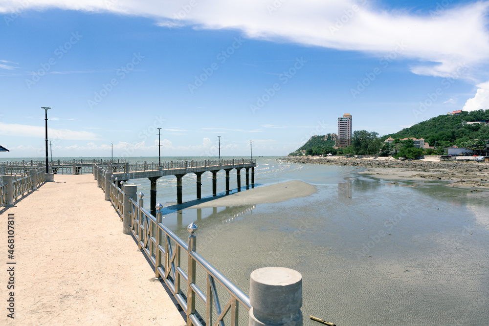 Fototapeta premium Bridge at Bang Saen beach with blue sky. Chonburi, Thailand.