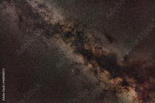 Night sky, many stars with milky way around Aquila and Sagitta constellation visible. Long exposure stacked photo photo
