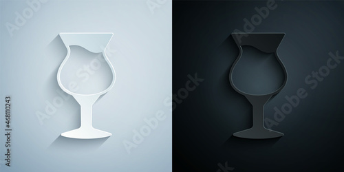 Paper cut Glass of beer icon isolated on grey and black background. Paper art style. Vector