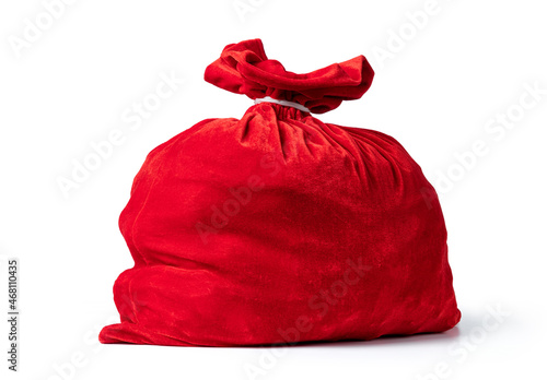 Big red sack of Santa Claus with gifts, isolated on white background. File contains a path to isolation. 