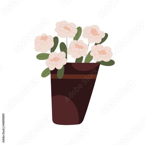 Fresh blossomed flowers in vase. Floral bouquet with gorgeous buds in pot. Bl...