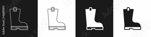 Set Waterproof rubber boot icon isolated on black and white background. Gumboots for rainy weather, fishing, gardening. Vector