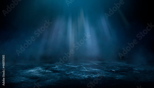 Dark street  wet asphalt  reflections of rays in the water. Abstract dark blue background  smoke  smog. Empty dark scene  neon light  spotlights. Concrete floor