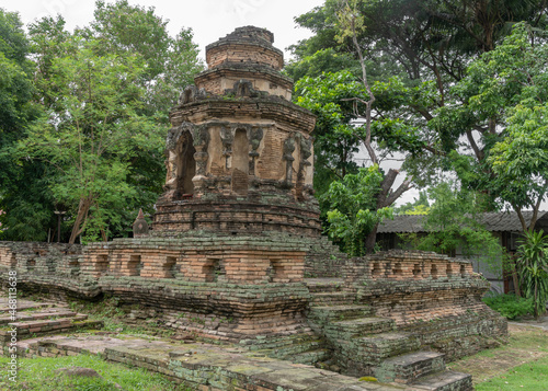 Scenic view of beautiful ancient Animisa chedi or stupa in the grounds of historic Wat Jed Yod or Wat Chet Yot buddhist temple in Chiang Mai, Thailand