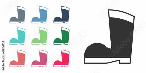 Black Waterproof rubber boot icon isolated on white background. Gumboots for rainy weather, fishing, gardening. Set icons colorful. Vector