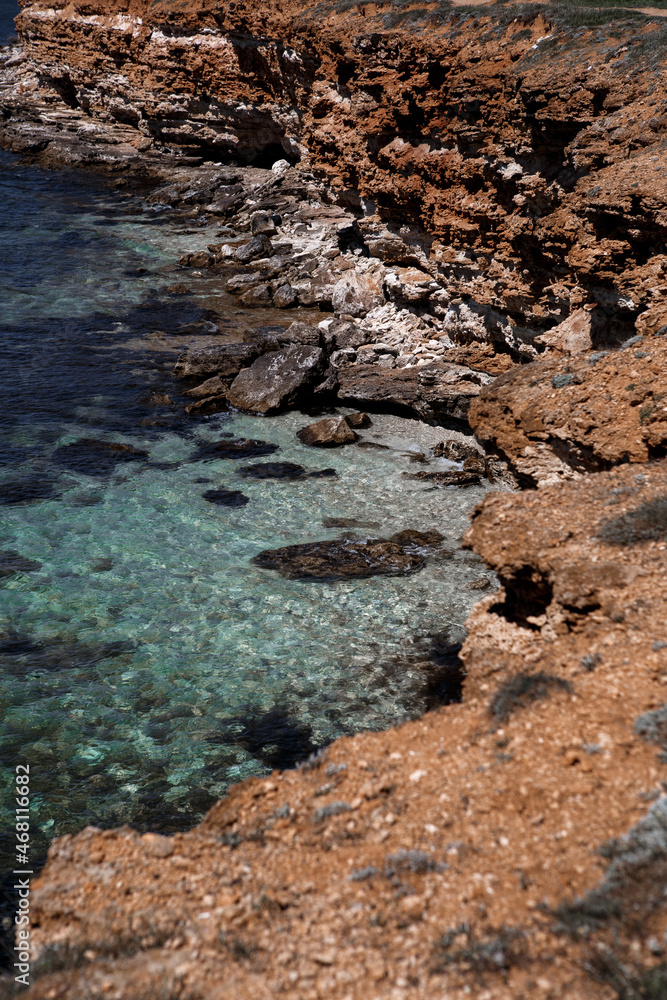 Yellow seashore with blue water Yellow seashore with blue water